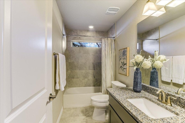 bathroom featuring visible vents, shower / bath combo with shower curtain, toilet, and vanity