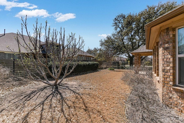 view of yard featuring fence