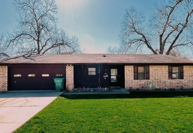 ranch-style house with driveway, roof with shingles, a front lawn, a garage, and brick siding
