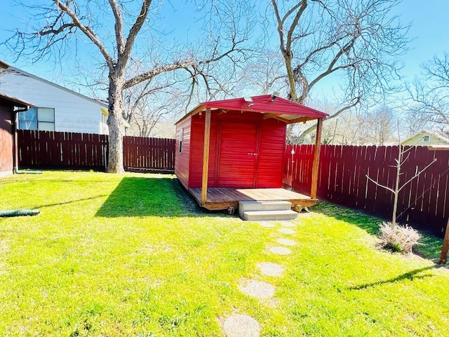view of shed featuring a fenced backyard