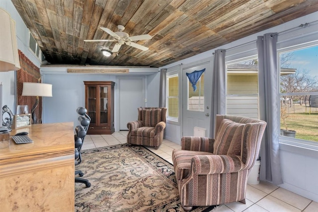 home office with tile patterned flooring, wood ceiling, and a healthy amount of sunlight