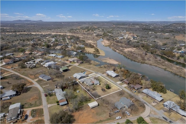 bird's eye view featuring a water and mountain view