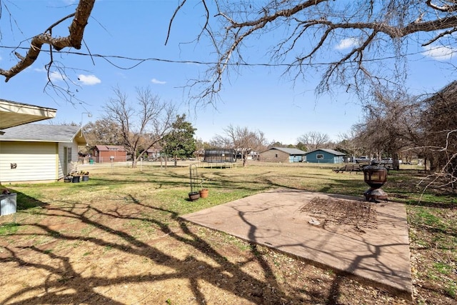 view of yard featuring a trampoline