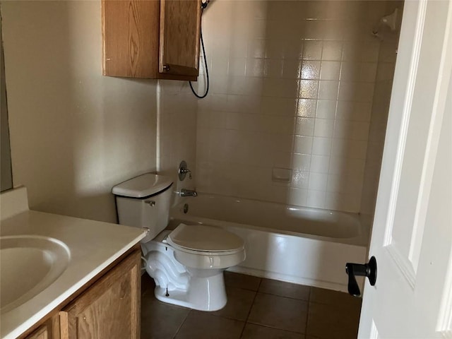 bathroom with shower / bathtub combination, toilet, tile patterned flooring, and vanity