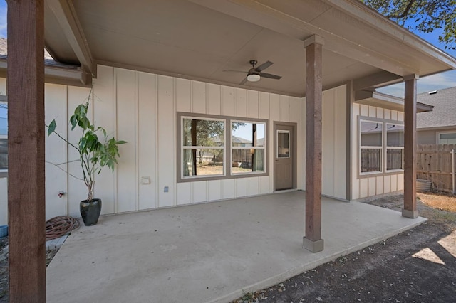 view of patio with fence and ceiling fan