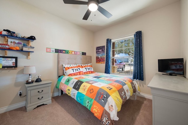 carpeted bedroom with baseboards and ceiling fan