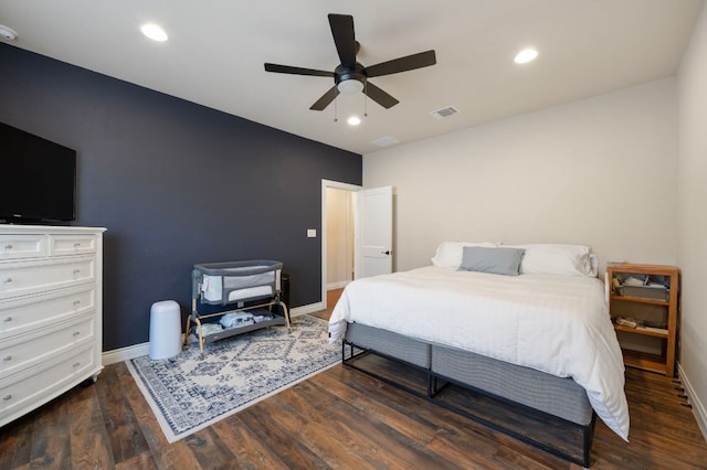 bedroom featuring recessed lighting, wood finished floors, and baseboards