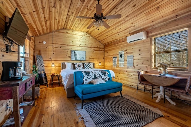 bedroom with wooden ceiling, hardwood / wood-style flooring, a wall unit AC, and vaulted ceiling