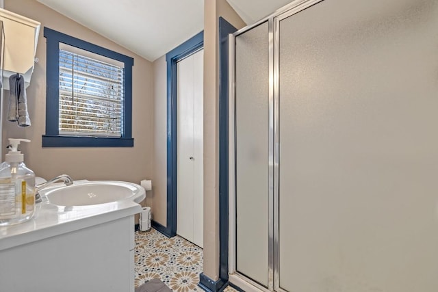 full bathroom with vanity, tile patterned floors, and a stall shower