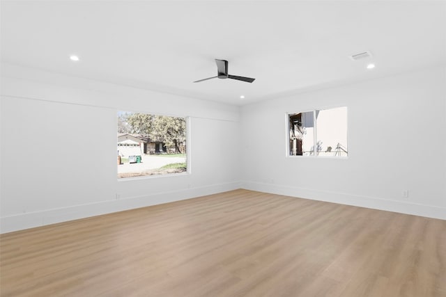 9229 Independence Loop, Austin, TX 78748 - empty room featuring light wood-style flooring, recessed lighting, a ceiling fan, and baseboards