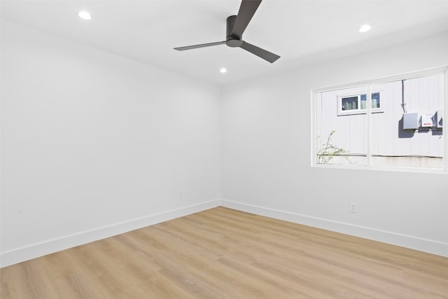 9229 Independence Loop, Austin, TX 78748 - empty room featuring light wood finished floors, baseboards, recessed lighting, and a ceiling fan