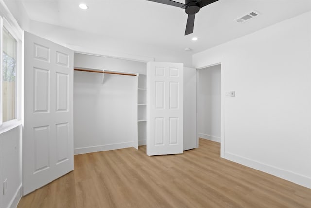 unfurnished bedroom with light wood finished floors, visible vents, recessed lighting, and baseboards