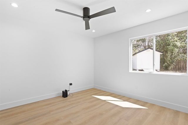 unfurnished room with recessed lighting, baseboards, light wood-style floors, and a ceiling fan