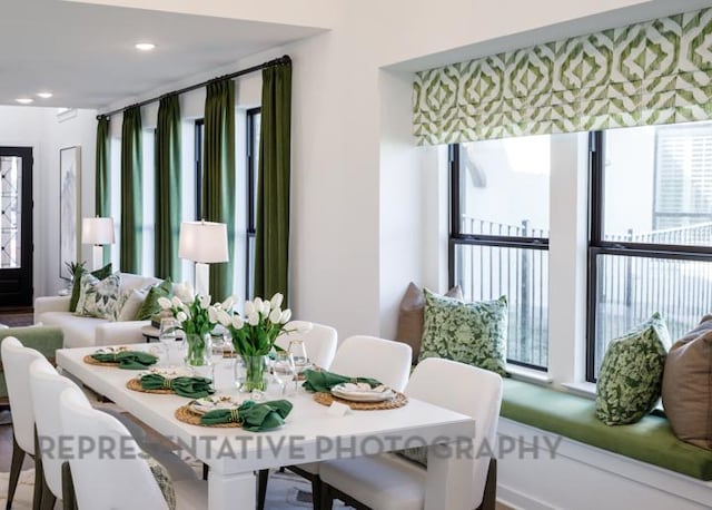 dining area with recessed lighting and plenty of natural light