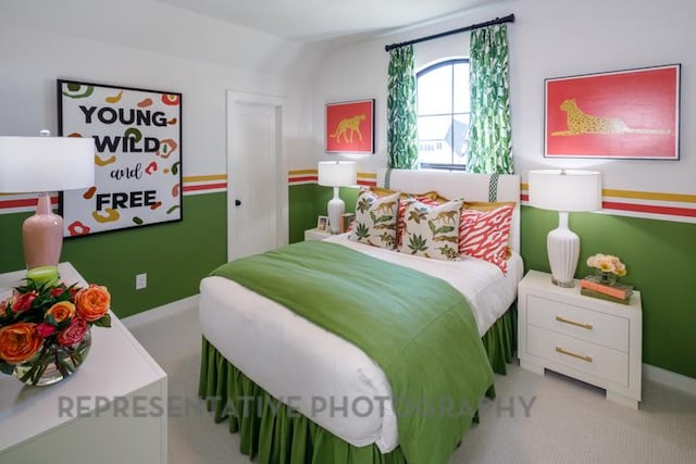 bedroom with light colored carpet