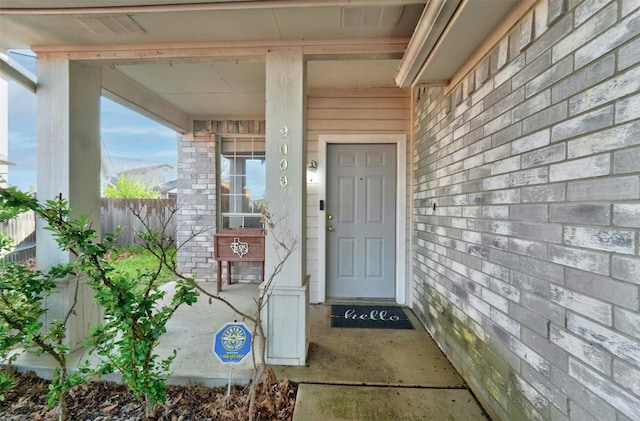 property entrance featuring fence