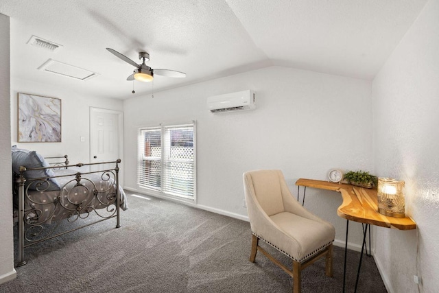 bedroom featuring visible vents, carpet, a wall mounted air conditioner, vaulted ceiling, and a textured ceiling