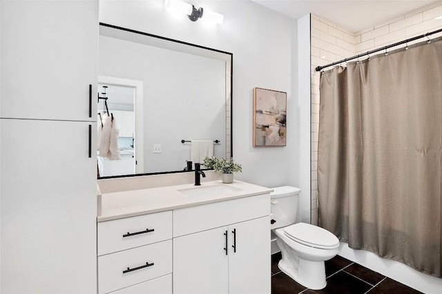 full bathroom with toilet, shower / bath combo, vanity, and tile patterned flooring