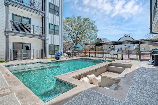 view of pool with a fenced in pool, a patio area, area for grilling, and fence