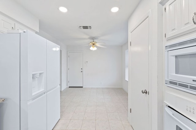 spare room featuring visible vents, recessed lighting, baseboards, and ceiling fan