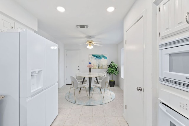 dining area featuring light tile patterned floors, visible vents, recessed lighting, and ceiling fan