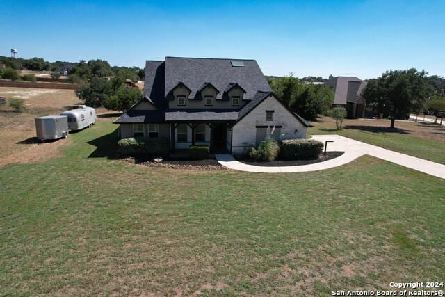 320 Mill Run, New Braunfels, TX 78132 - view of front of house featuring a front yard and covered porch