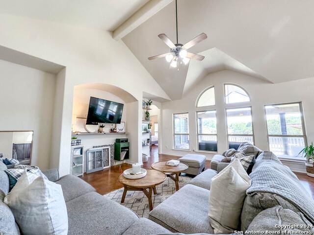 320 Mill Run, New Braunfels, TX 78132 - living area with a ceiling fan, wood finished floors, high vaulted ceiling, and beamed ceiling