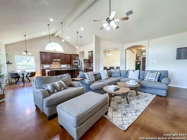 320 Mill Run, New Braunfels, TX 78132 - living room with concrete flooring, ceiling fan, arched walkways, high vaulted ceiling, and beamed ceiling