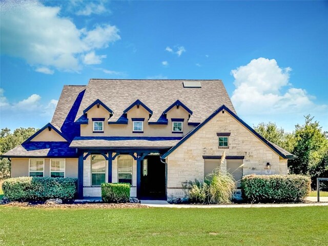 320 Mill Run, New Braunfels, TX 78132 - view of front of home featuring a front yard, a shingled roof, and covered porch