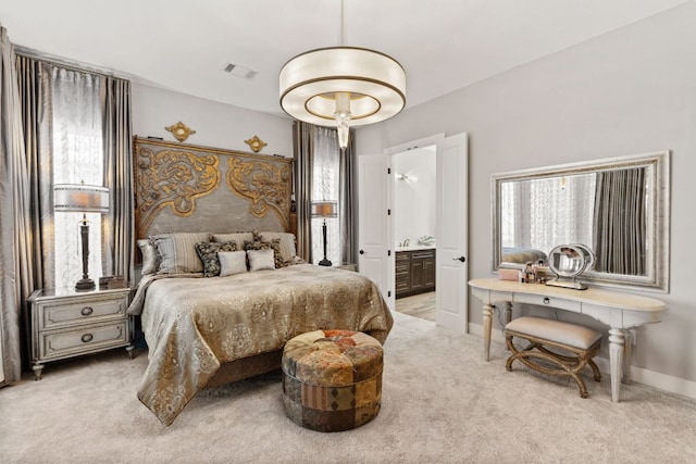 bedroom with multiple windows, carpet flooring, baseboards, and visible vents