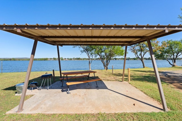 view of patio featuring a water view