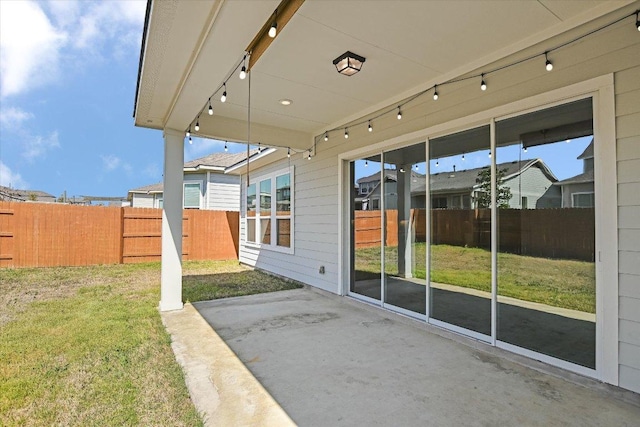 view of patio with fence