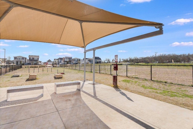 view of patio / terrace featuring fence