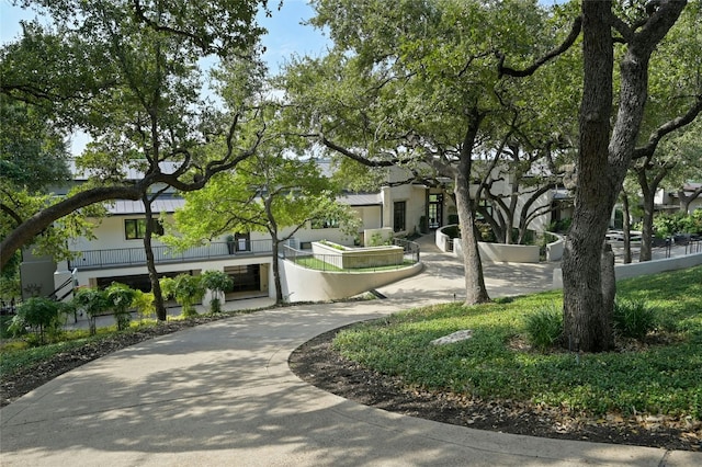 surrounding community featuring stairway