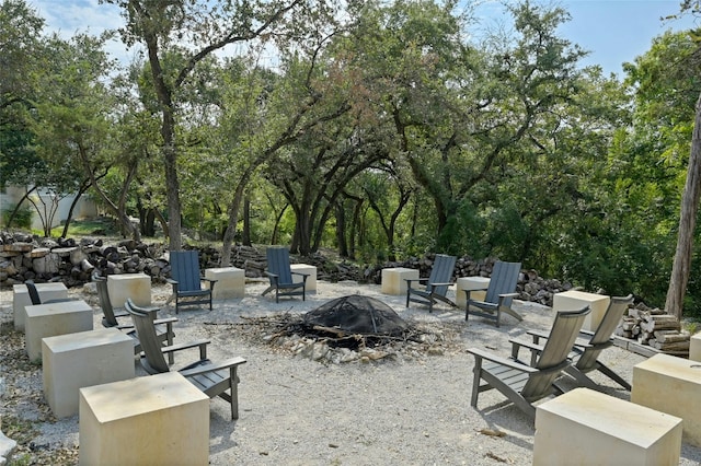 view of patio with a fire pit