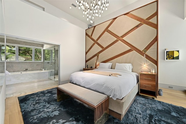 bedroom with an inviting chandelier and visible vents