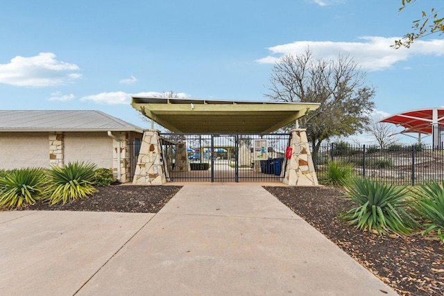 view of patio / terrace with a gate and fence