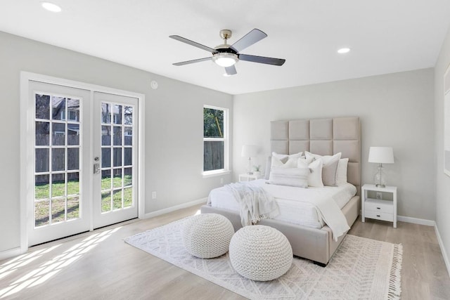 5213 Summerset Trl, Austin, TX 78749 - bedroom featuring french doors, multiple windows, access to outside, light wood-style floors, and recessed lighting