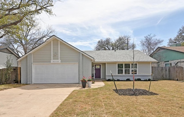 single story home featuring brick siding, driveway, a front yard, and fence