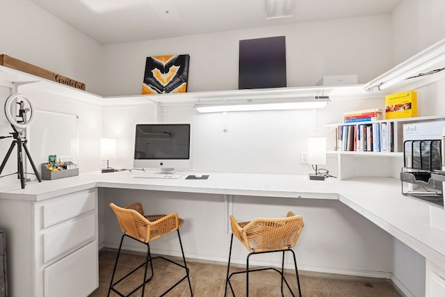 tiled office with built in study area