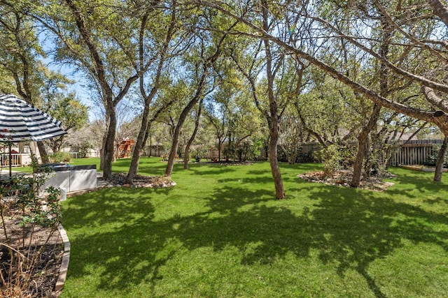 view of yard with fence