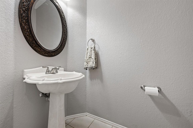 bathroom with tile patterned flooring