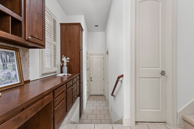 interior space featuring light tile patterned floors