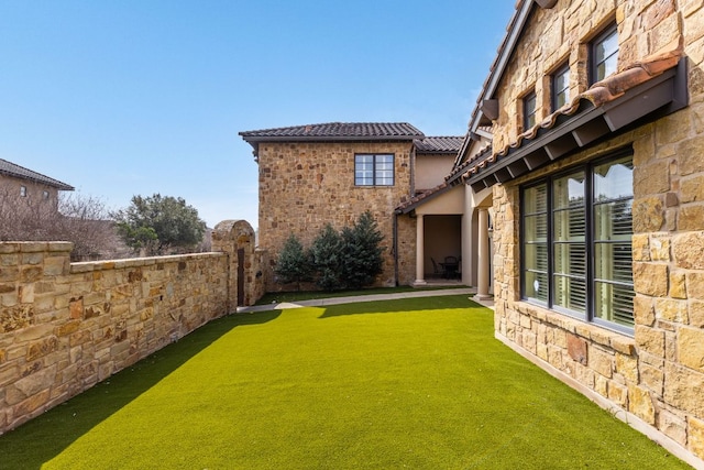 view of yard featuring fence