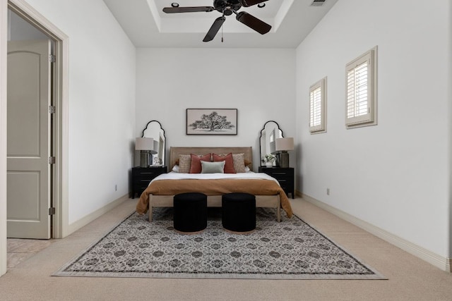 9100 Calera Dr Unit 10, Austin, TX 78735 - bedroom with carpet, a tray ceiling, ceiling fan, and baseboards