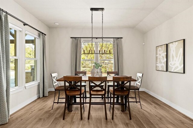 530 Crosswater Ln, Dripping Springs, TX 78620 - dining room featuring plenty of natural light, wood finished floors, and baseboards