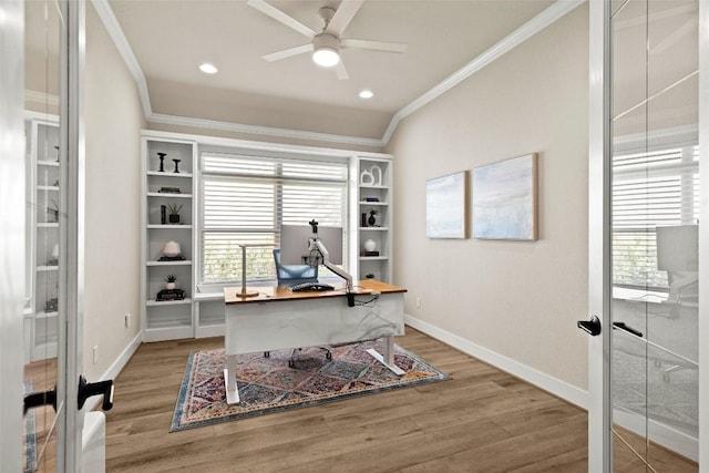 home office with baseboards, ceiling fan, ornamental molding, french doors, and light wood-style floors