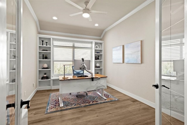 office area with french doors, light wood finished floors, ornamental molding, a ceiling fan, and baseboards