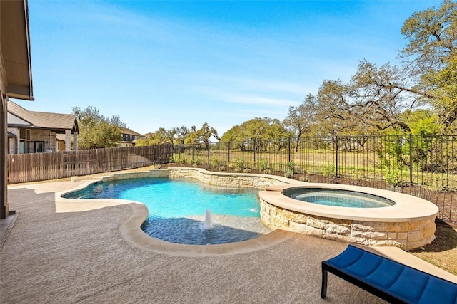 view of pool with a patio, a pool with connected hot tub, and a fenced backyard