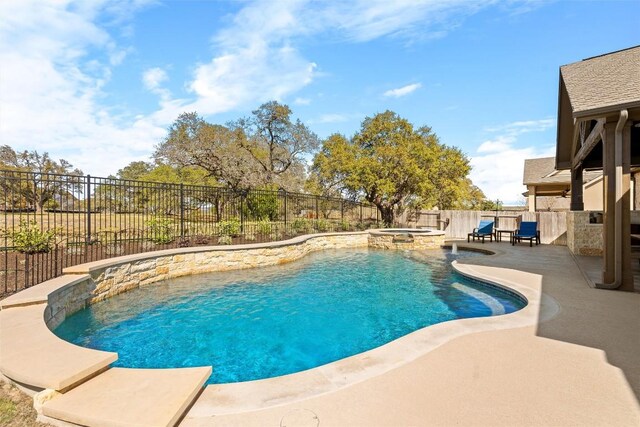 530 Crosswater Ln, Dripping Springs, TX 78620 - view of swimming pool featuring a fenced backyard, a patio area, and a pool with connected hot tub